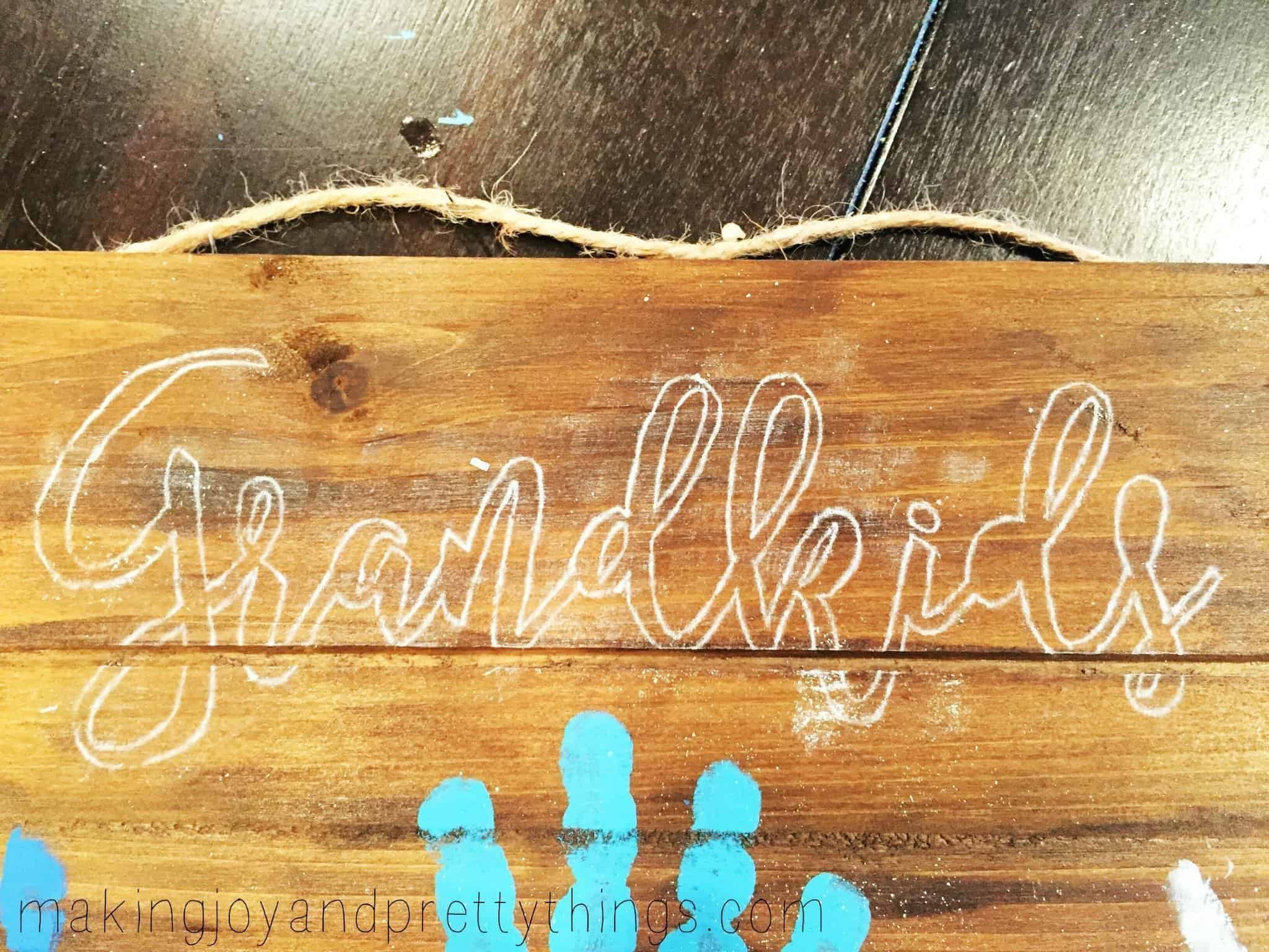 A look at how the transfer looks after you traced the font onto the handprint art for grandma