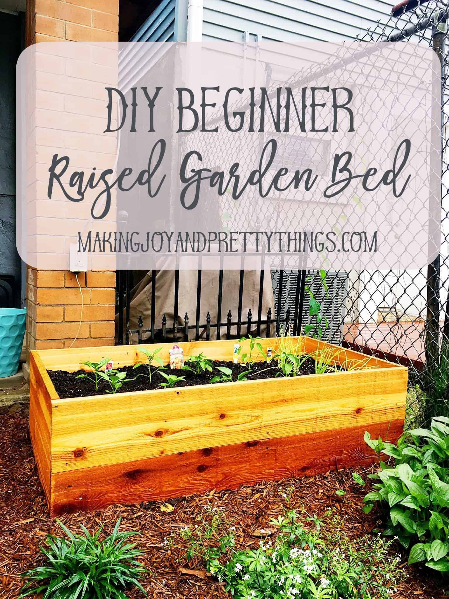 DIY Beginner Raised Garden Bed perfect for small yards and beginner gardeners. Easy DIY that can be done in an afternoon.