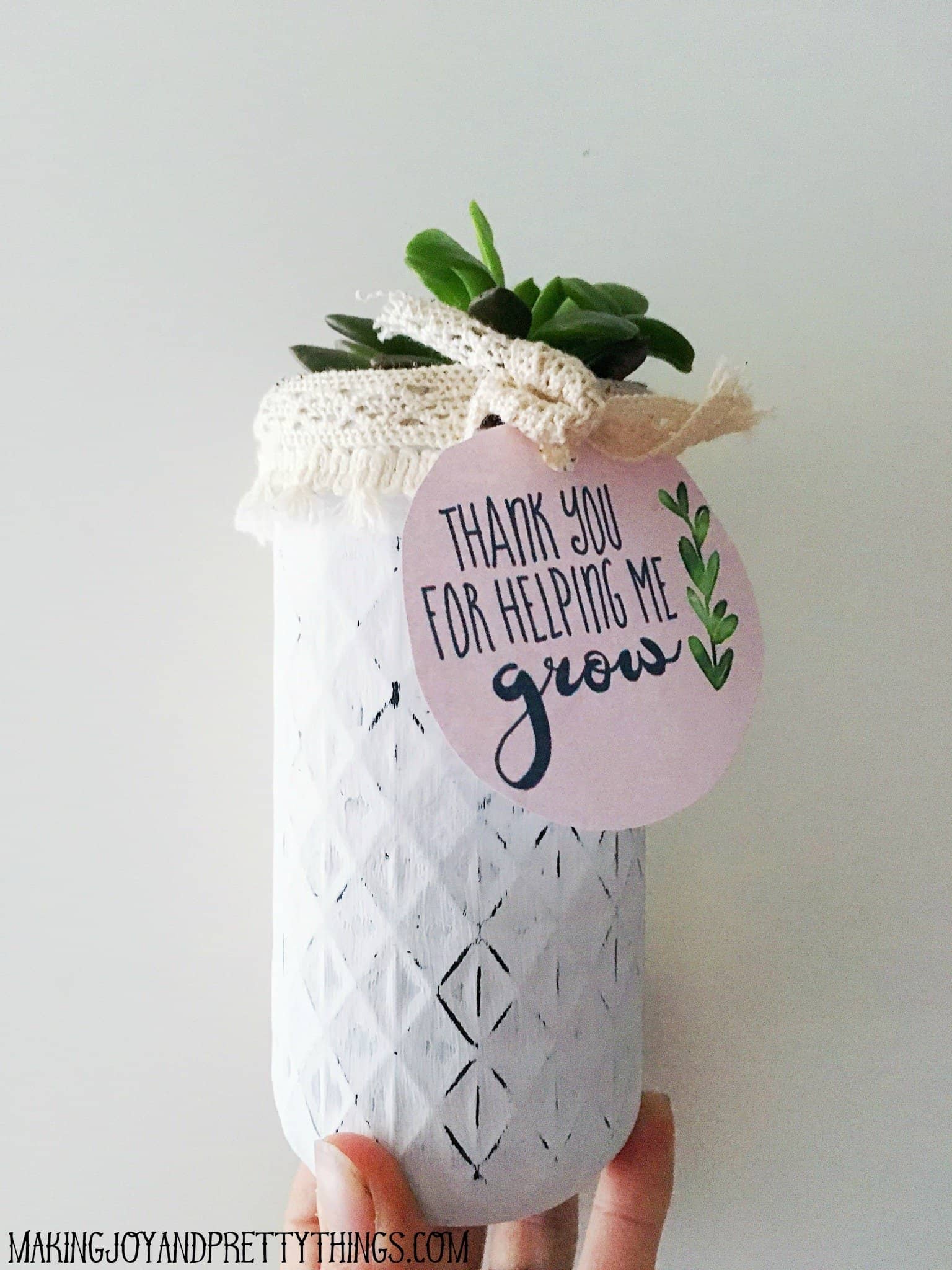 DIY mason jar distressed with white paint and sanded makes a great teacher gift at the end of the school year
