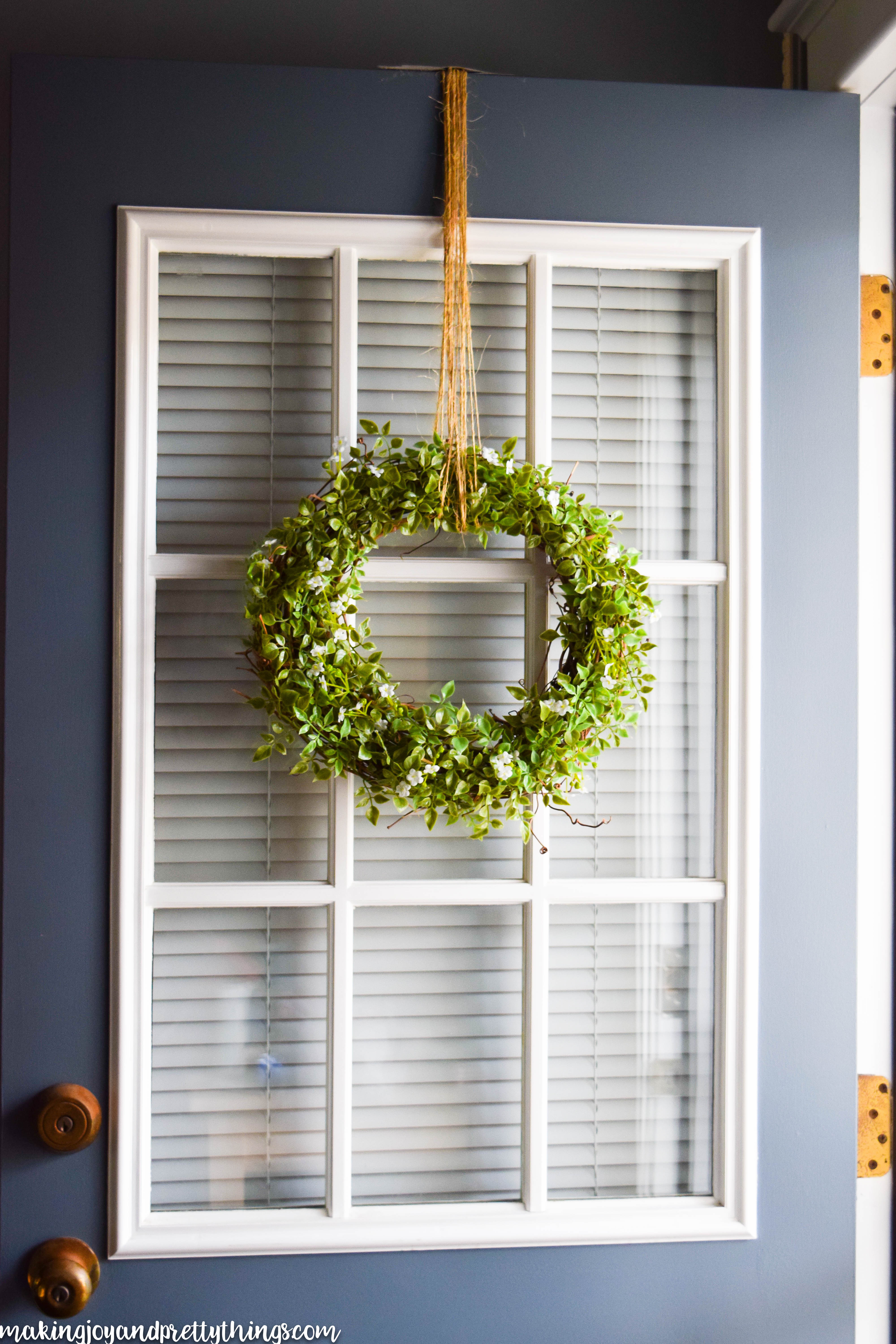 This simple farmhouse wreath is an easy DIY to add fixer upper and farmhouse style to your home. Easy to make and has a beautifully simple finish. Bring the farmhouse style home decor into your home