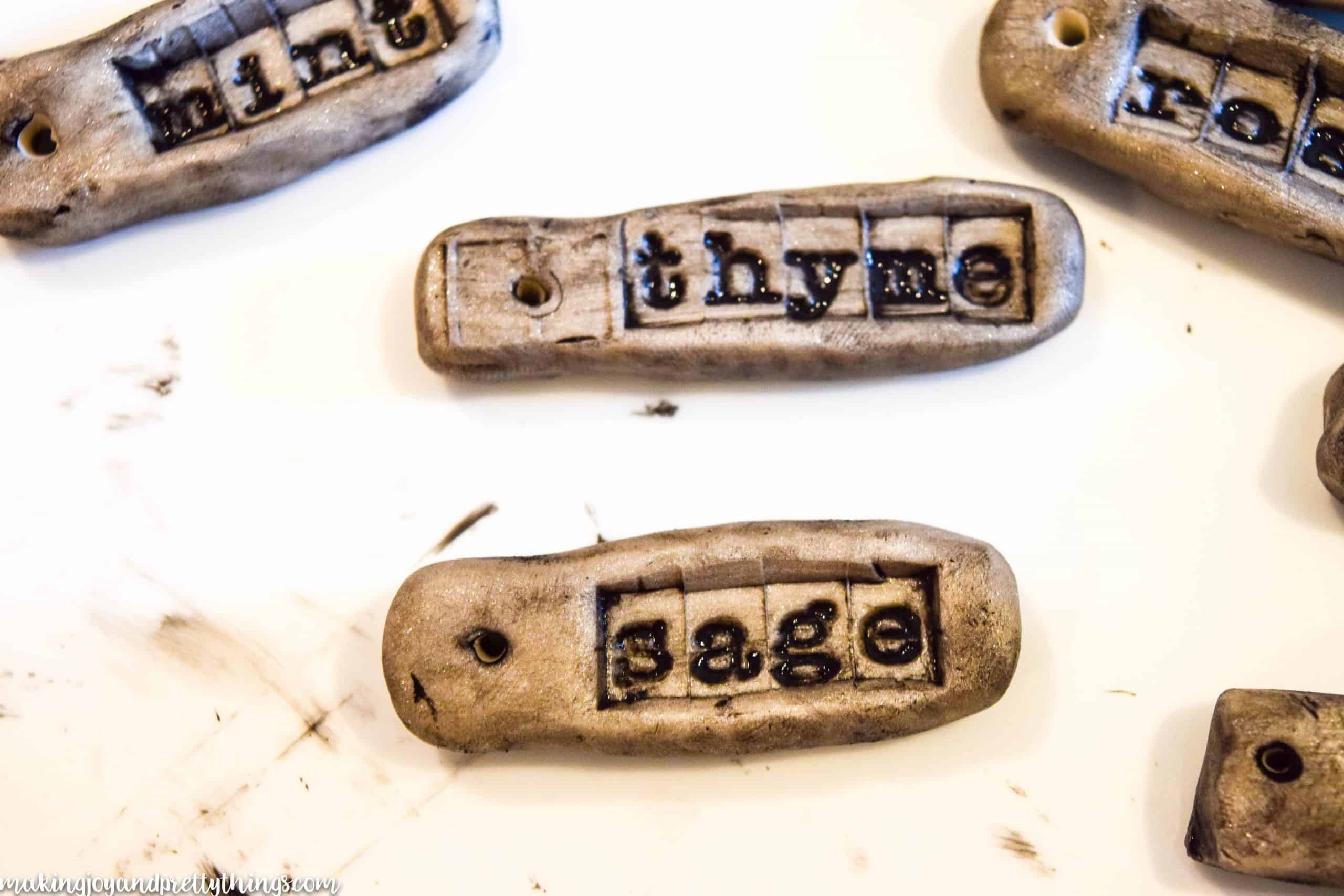 Sage plant label made with acrylic paint and letter stamps on oven baked clay is a great and easy DIY