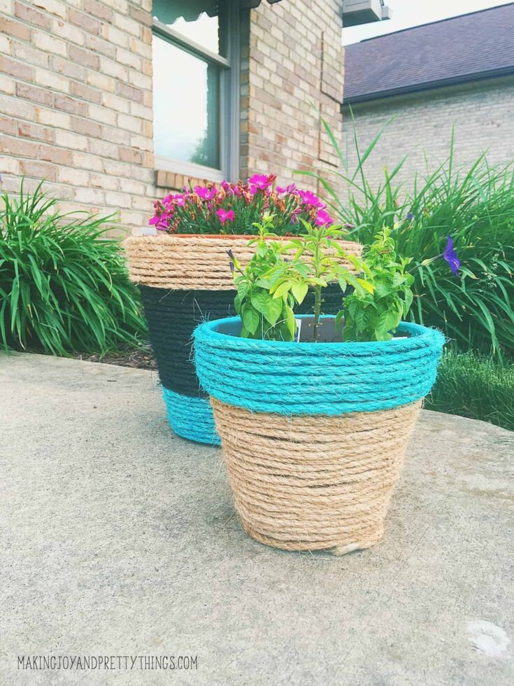 Rope wrapped and painted DIY planters. Perfect easy DIY to kick off summer. Can be customized with any color to compliment your garden area. Makes a great DIY gift.