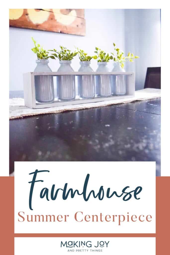 Photo of a plant in a vase used as a centerpiece with text overlay that reads 'Farmhouse Summer Centerpiece.'