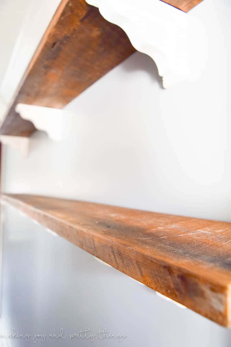 DIY Farmhouse Shelves for the Dining Room. So easy to make your own fixer upper inspired shelves using reclaimed wood