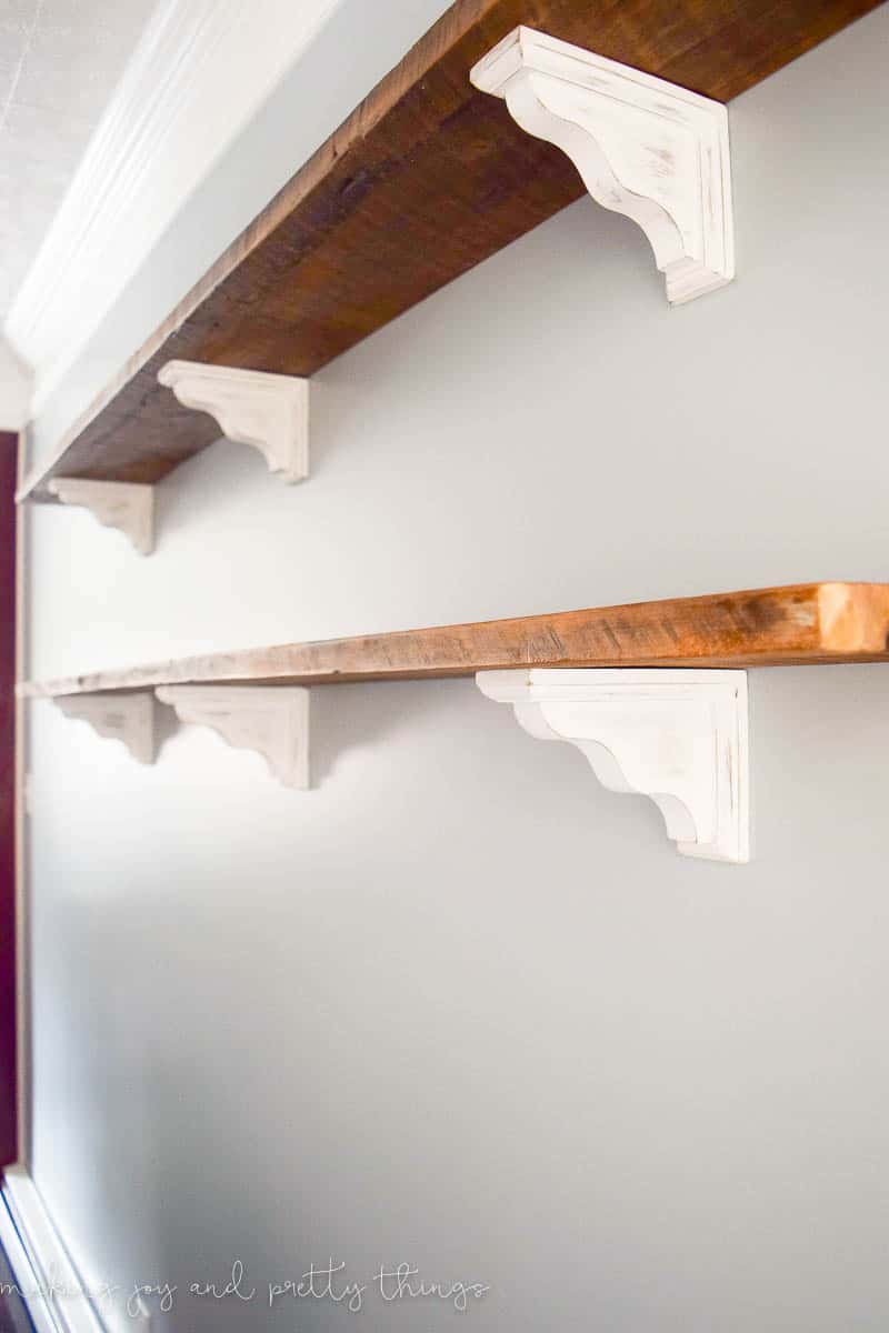 DIY Farmhouse Shelves for the Dining Room. So easy to make your own fixer upper inspired shelves using reclaimed wood
