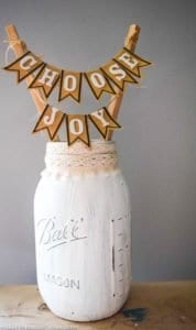DIY farmhouse inspired mason jar display. Easy DIY craft to bring farmhouse style into your home decor. Budget friendly and sends great message.