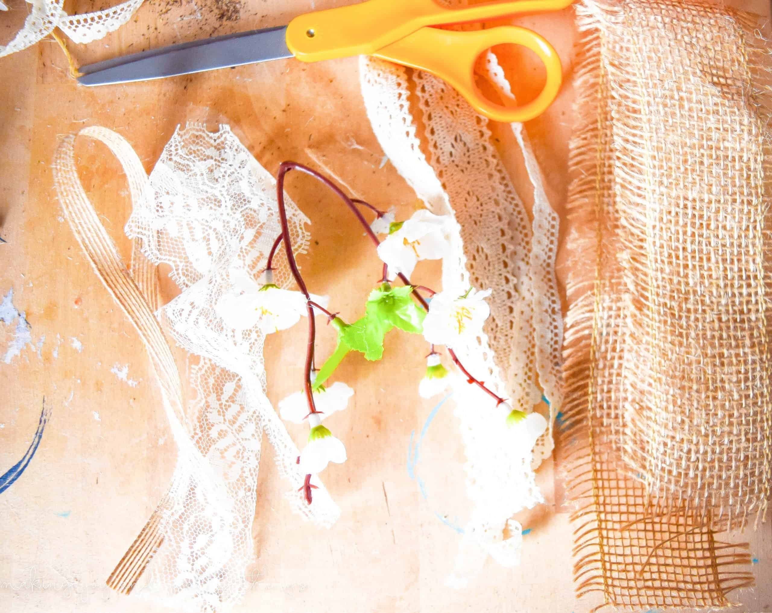 Scissors are a great way to cut down lace and burlap to hang on a sprint mantel garland