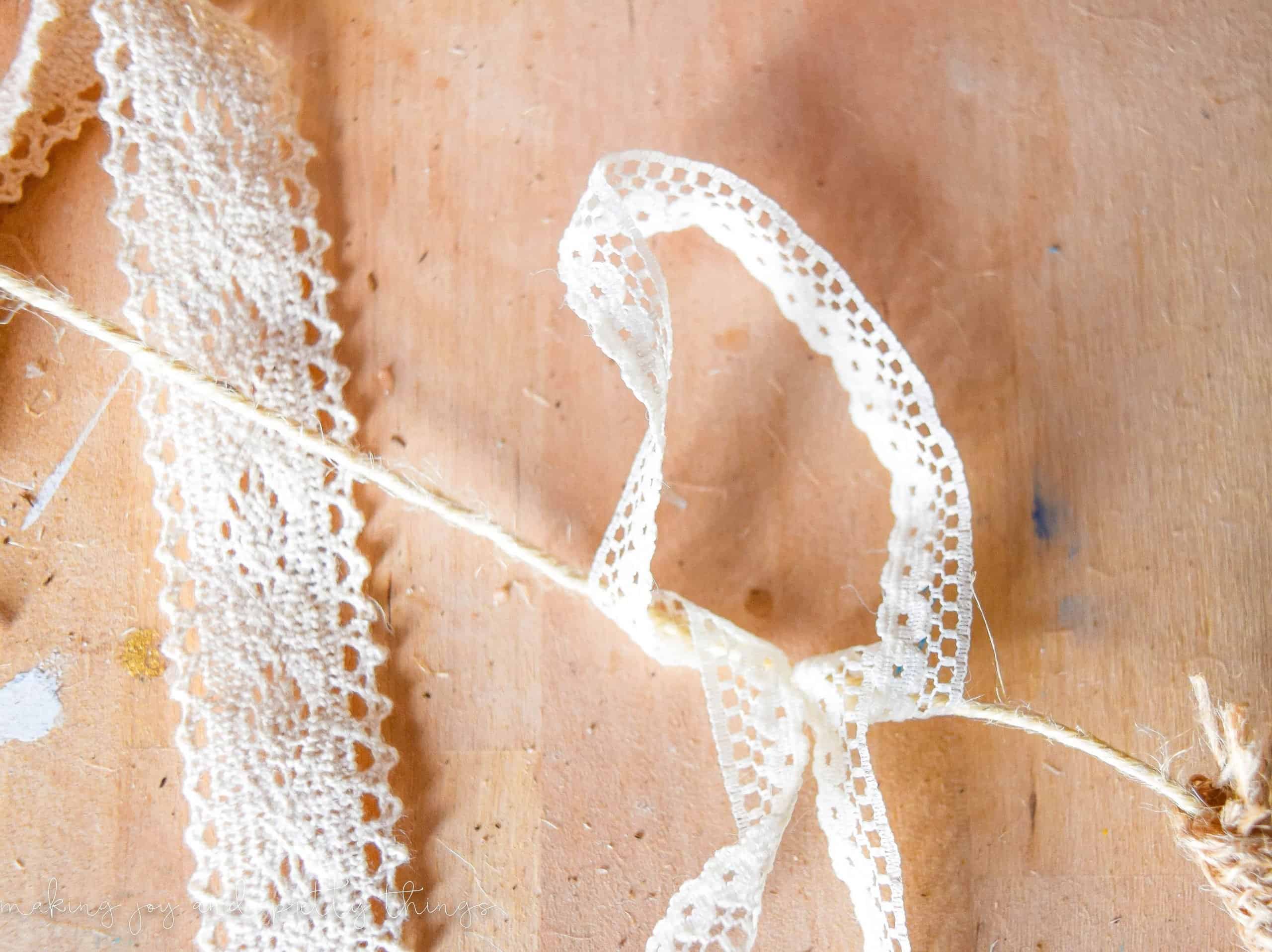 tying a knot with lace is easy and simple and creates a great spot to secure any type of supply 