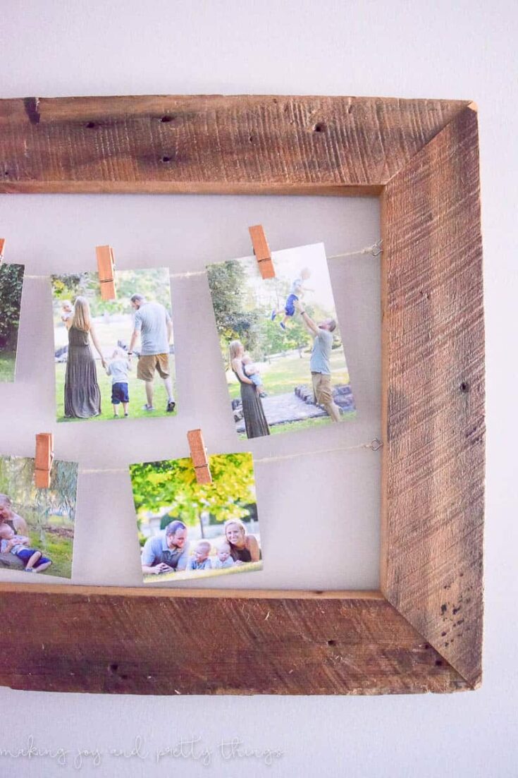 DIY rustic picture frame made with barnwood, twine, and clothespins.