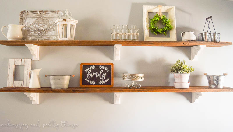 The other thing to consider when you are styling open shelves is balancing out all the different types of decor you have