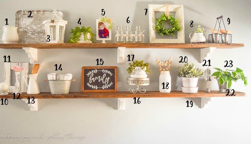 Source list identified photo for DIY decorations made with barn wood and corbels to give a farmhouse style look in a living room