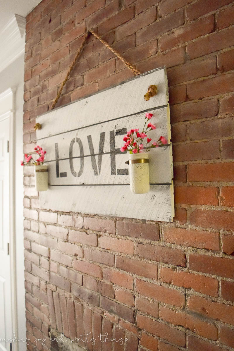 Get the farmhouse look in your home with this DIY shiplap sign to hang on your wall