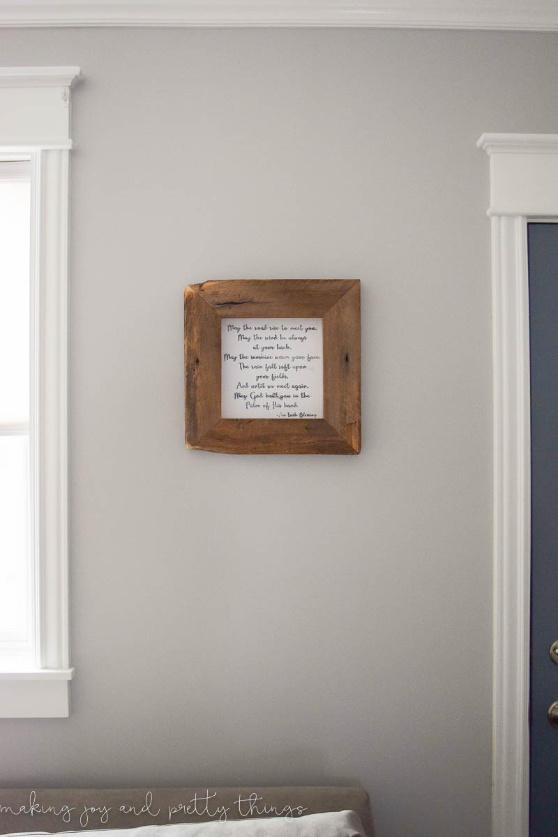 Rustic farmhouse decor art frame hung on the wall with an Irish blessing put inside and hung up on the wall 