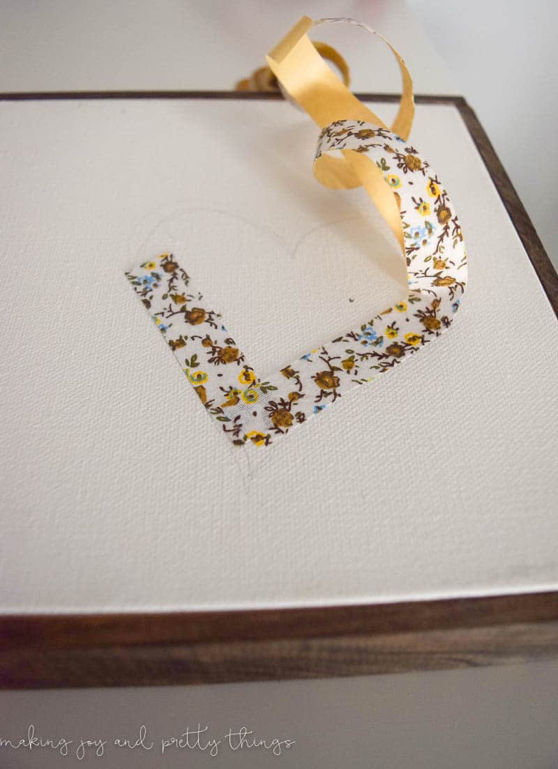 Using tape to add flare to the canvas frame that you just learned how to make is easy and fun