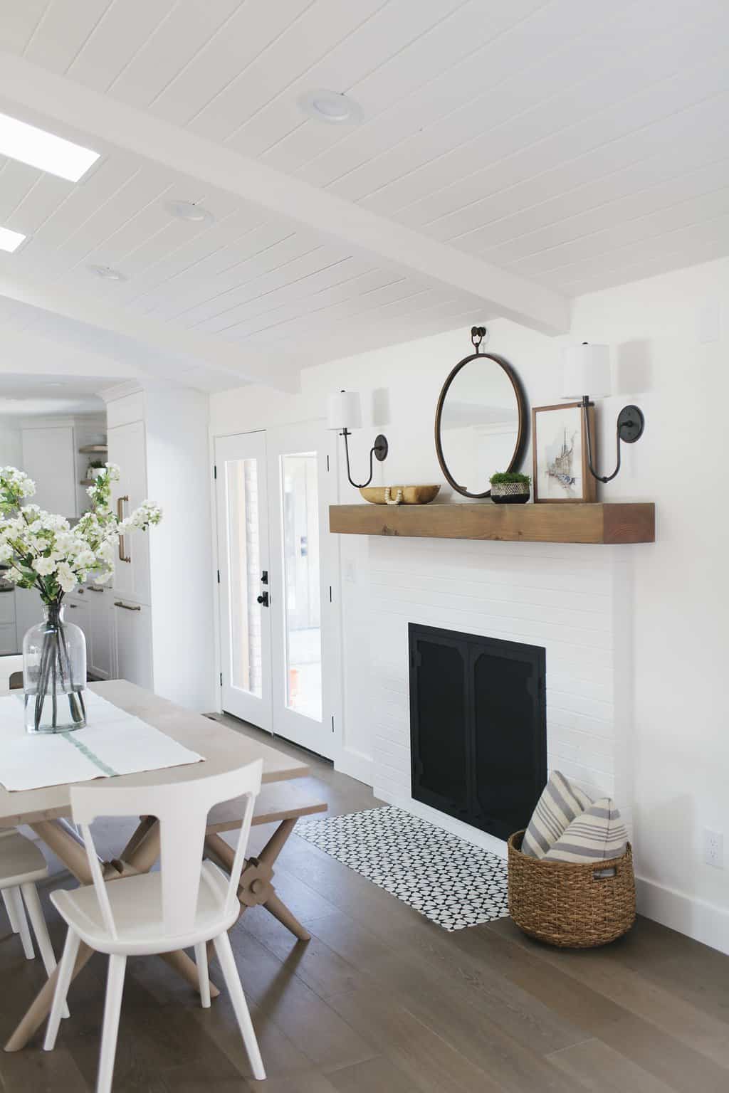 A little splash of white and black cement tile works for this modern fireplace design from House of Jade