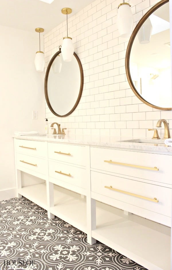 This gray and white Merola tile looks amazing installed on the floor of this master bathroom floor from the House of Silver Lining 