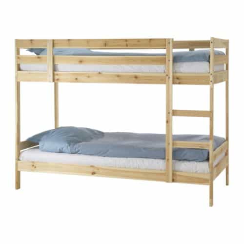 Wooden bunk bed to be used in a shared kids bedroom to create extra space 