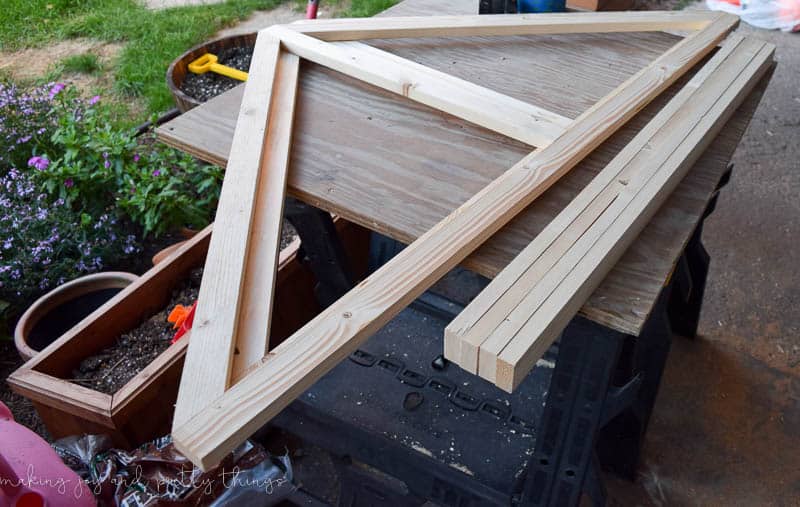 trusses and a wooden structure for a kids tent in a shared kids room 