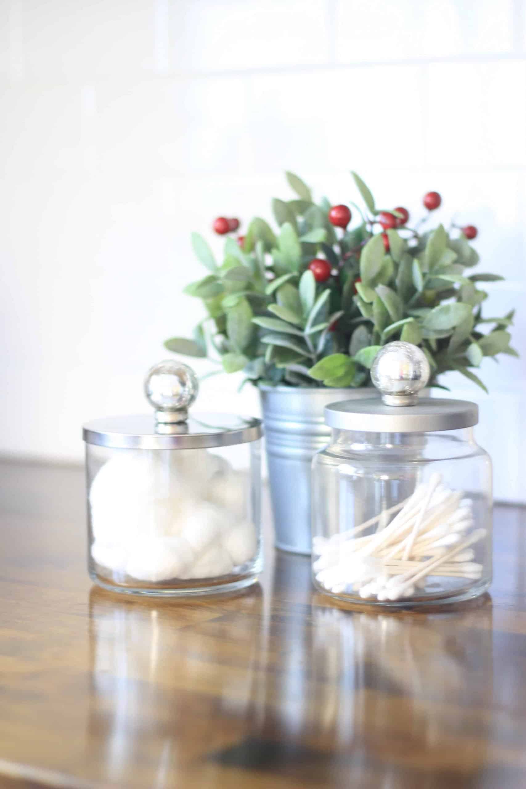Rustic bathroom containers for every day bathroom items such as q tips, cotton balls and other toiletries. 