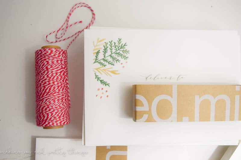 Red twine used to decorate Christmas cards that were created with minted.com and sent out for Christmas