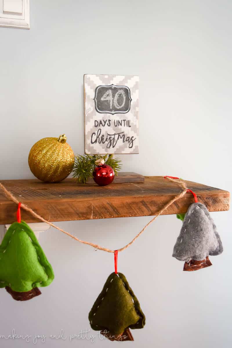 Get into the holiday spirit by making a fun and easy farmhouse rustic DIY Christmas countdown sign!