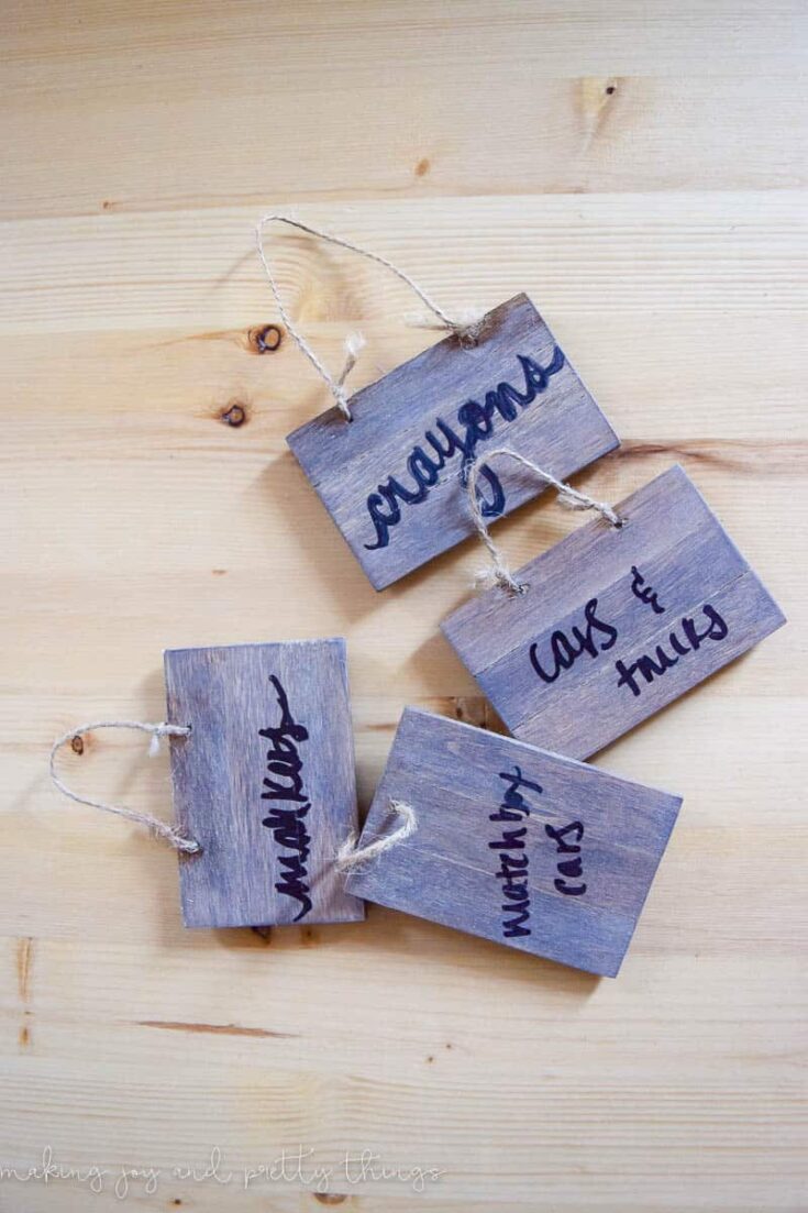 Mini DIY basket labels made from small pallet wood pieces.