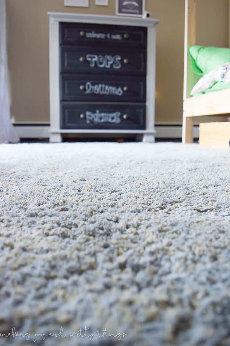 a carpet focus with a charming diy cabinet for your boys.
