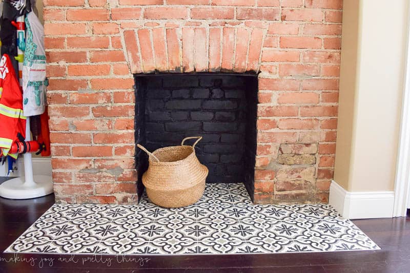 A shared boys' bedroom with bricks and an adorable basket.