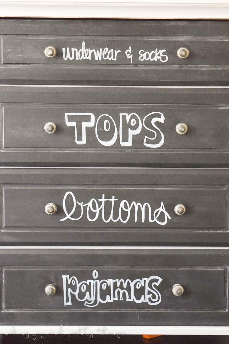 The cabinet was painted with chalkboard paint.