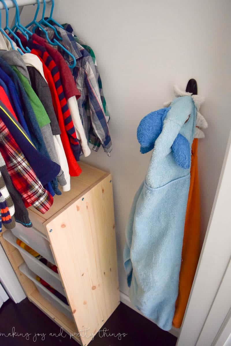 A photo of a hook that works perfectly on the cabinet closet, which is where they store their hooded towels.