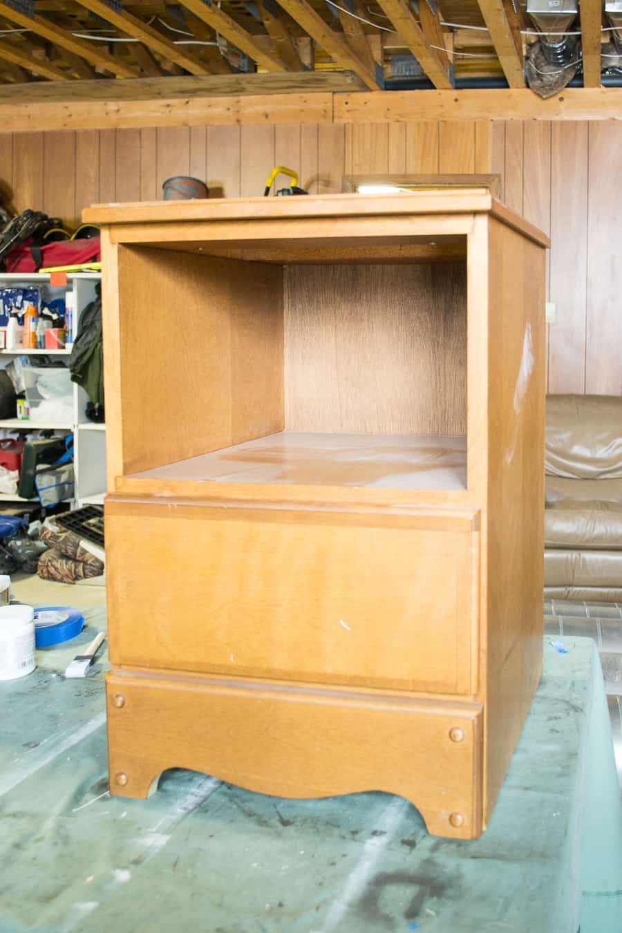 Take an old piece of furniture and begin sanding to clean off any old or dirty grime to prepare for a makeover