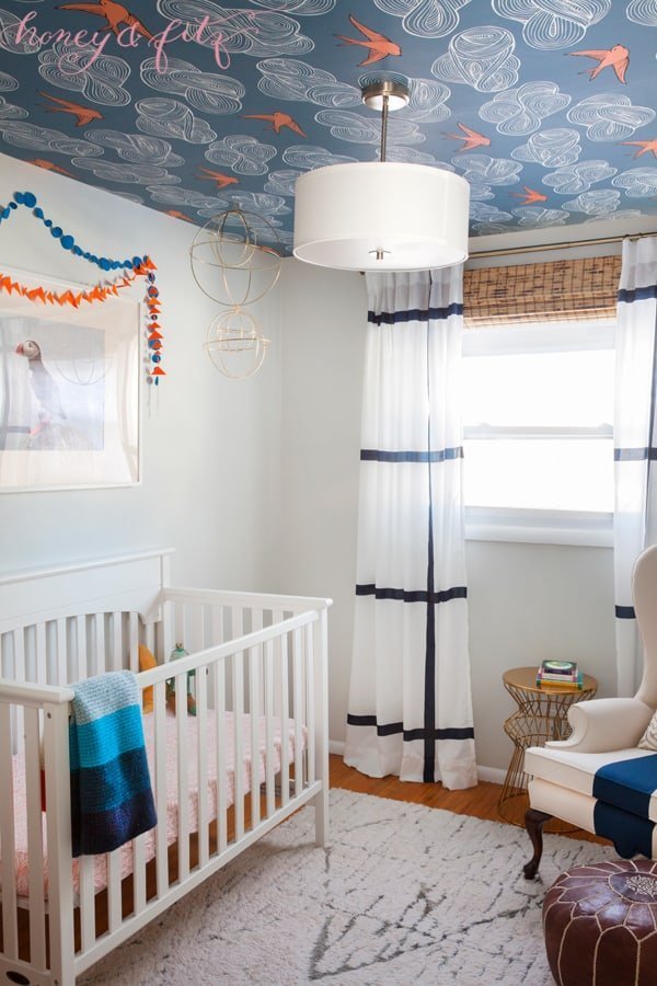 This beautiful unique wallpaper really sets the tone in this nursery and is such a modern and fun wallpaper