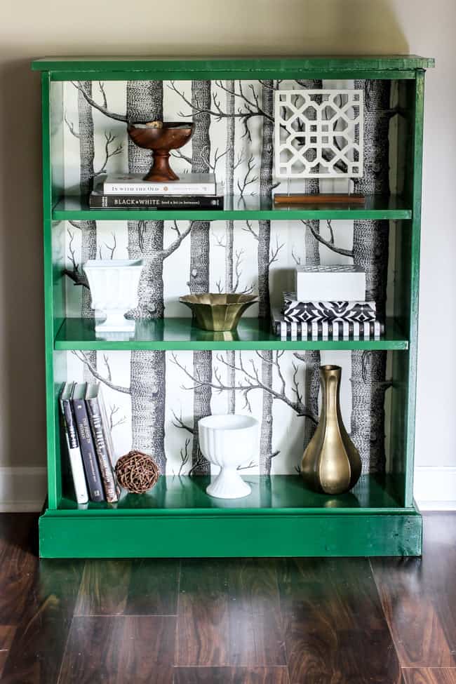 Transform an old bookshelf in this creative way to use wall coverings