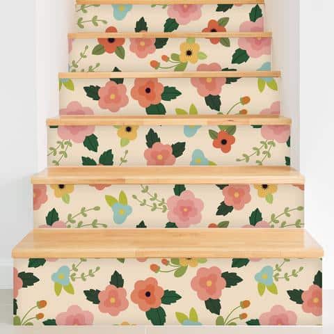 These stair risers really pop with this floral wallpaper and is such a great idea