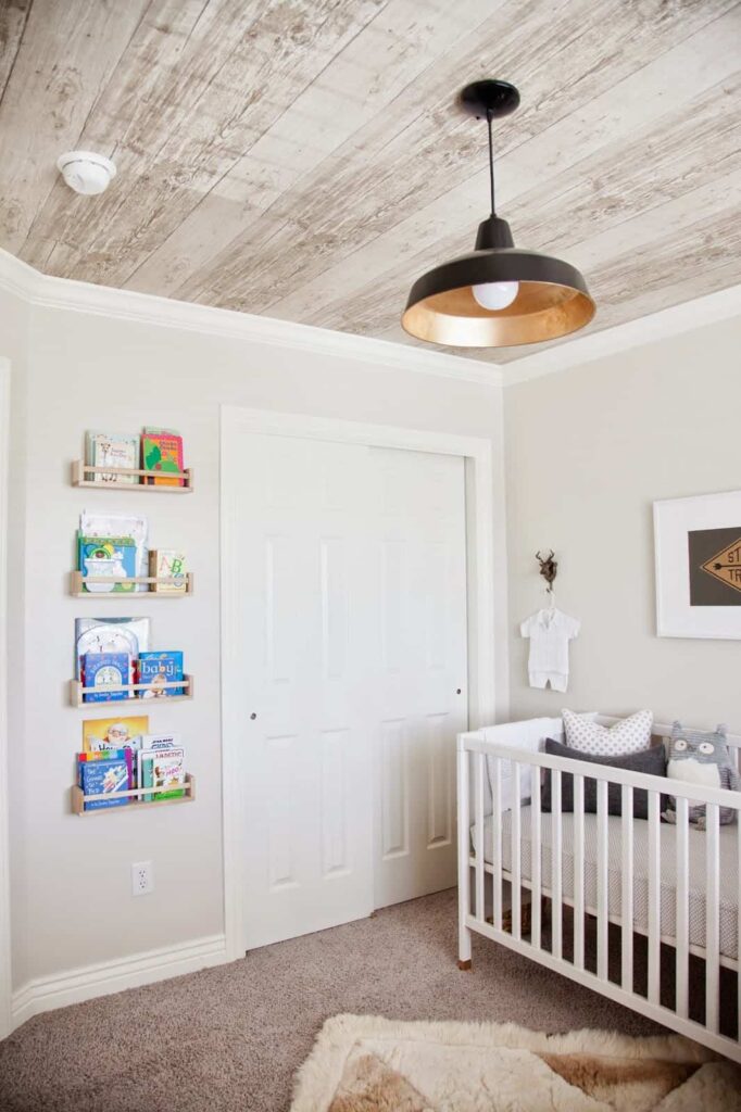 There are so many patterns and designs for wallpaper including this wood look put on the ceiling in a nursery