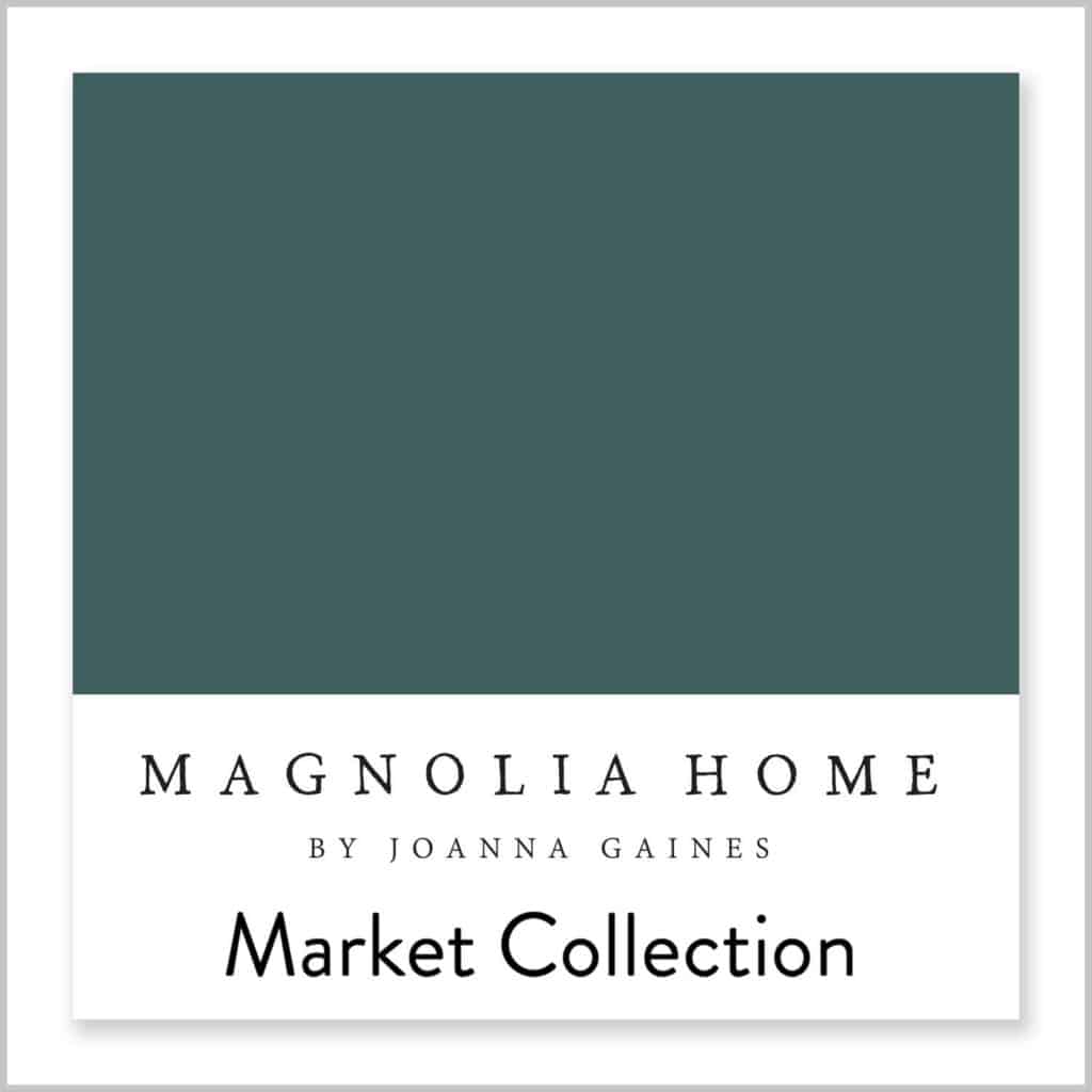 Weekend paint color from Magnolia Home is a a pretty jewel toned teal blue paint color that is bold and moody. It looks great painted on the top portion of the walls int this bathroom.