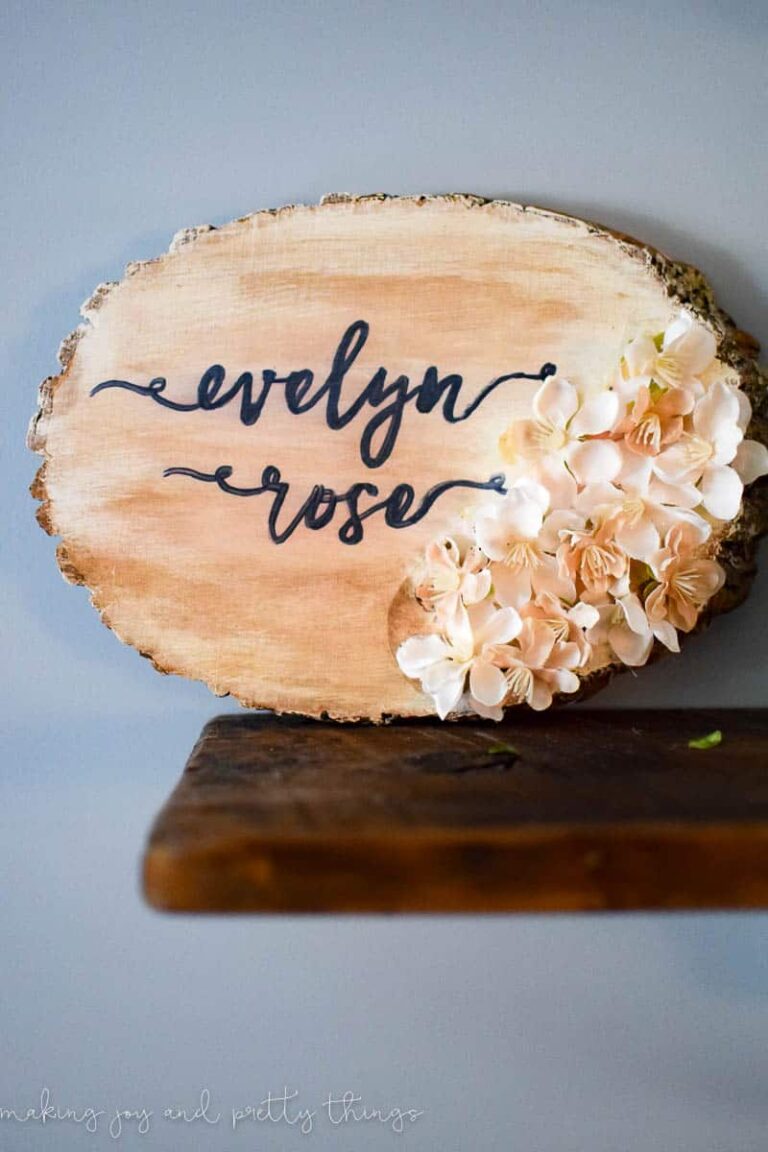 Add a bit of farmhouse decor to your girl nursery decor with an easy DIY craft personalized nursery wood slice sign
