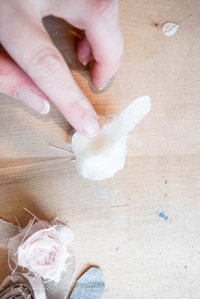 After you glue a fabric flower you have to add a backing to the flower to hold its shape and look