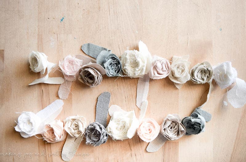 DIY fabric flowers made for a garland are a great how to and appropriate for any skill level that don't require any sewing