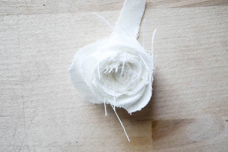 White linen flower wrapped and ready to glue these are simple to make and an easy DIY 