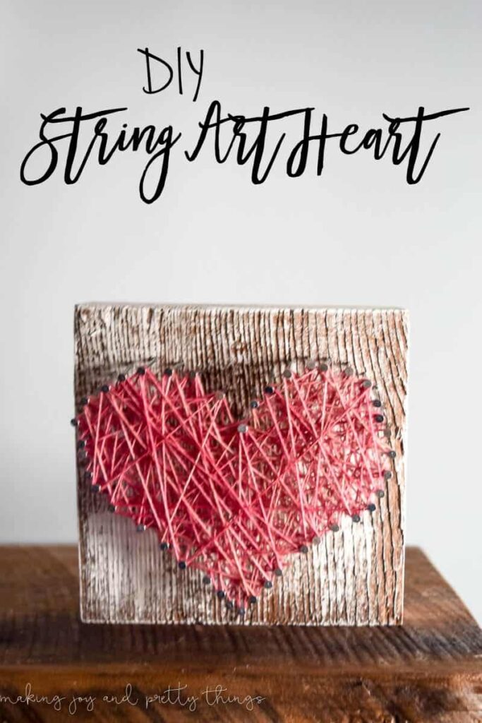 This DIY string art heart on rustic barnwood is so easy! 