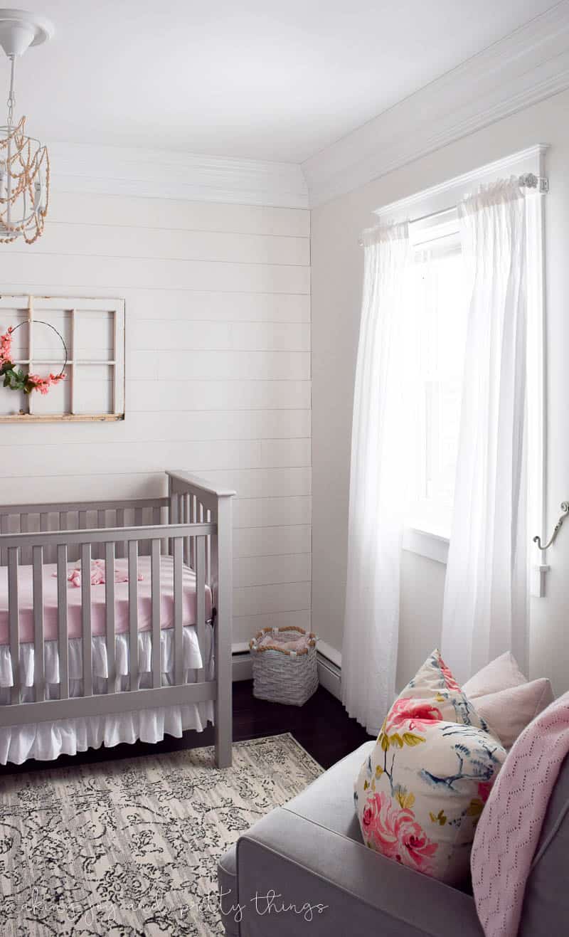Farmhouse nursery ideas in a girls bedroom that is completely renovated and full of charm and finishing touches.
