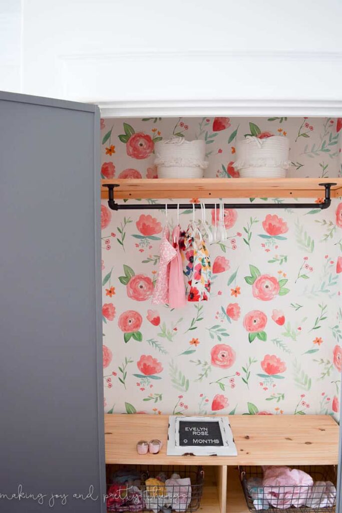 A wardrobe or closet with a cute floral print is the perfect backdrop for a wallpaper idea.