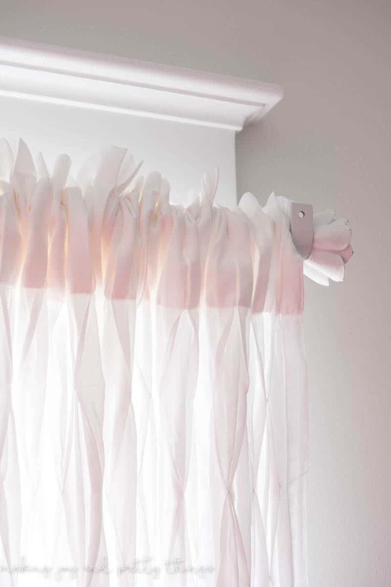 Farmhouse curtain rods really glow with white curtains using rose knobs from hobby lobby