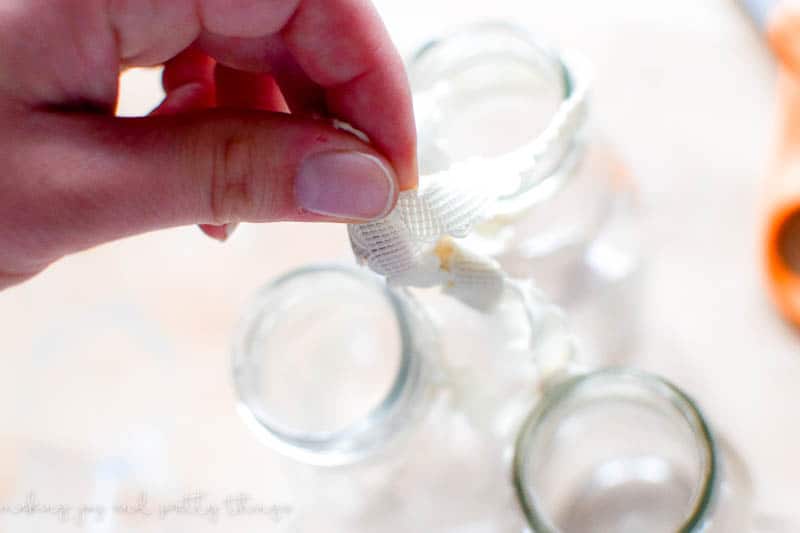 Ribbon is a great vintage way to attach multiple hanging jars together and is an easy DIY that requires no tools