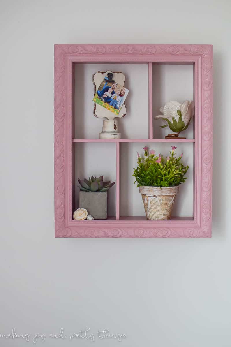 If your looking for shadow box ideas this pink picture frame is a great way to add some character
