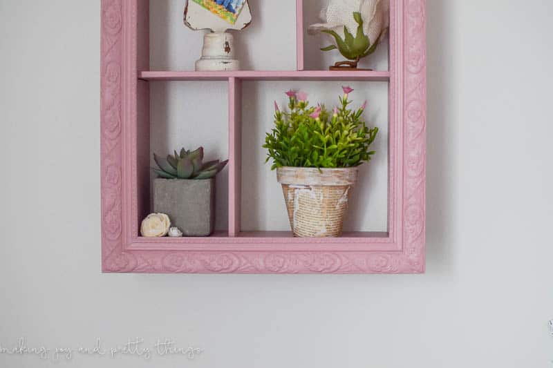 Adding Compartments and shelves to your DIY shadow box is a great way separate spaces for decor