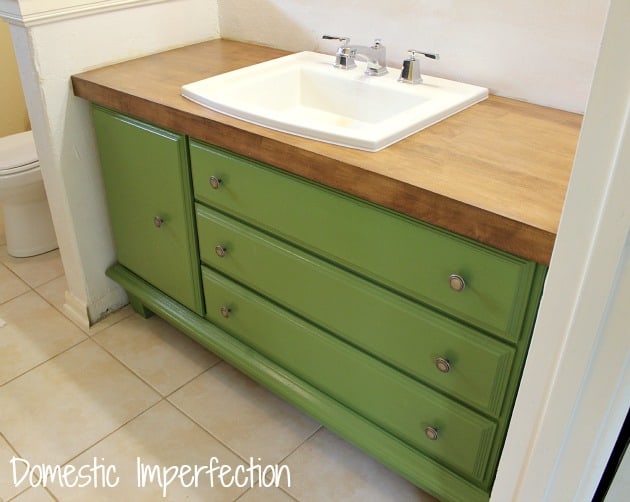 Any paint color can work when converting an old dresser into a vanity even build ins look so much better with a fresh coat