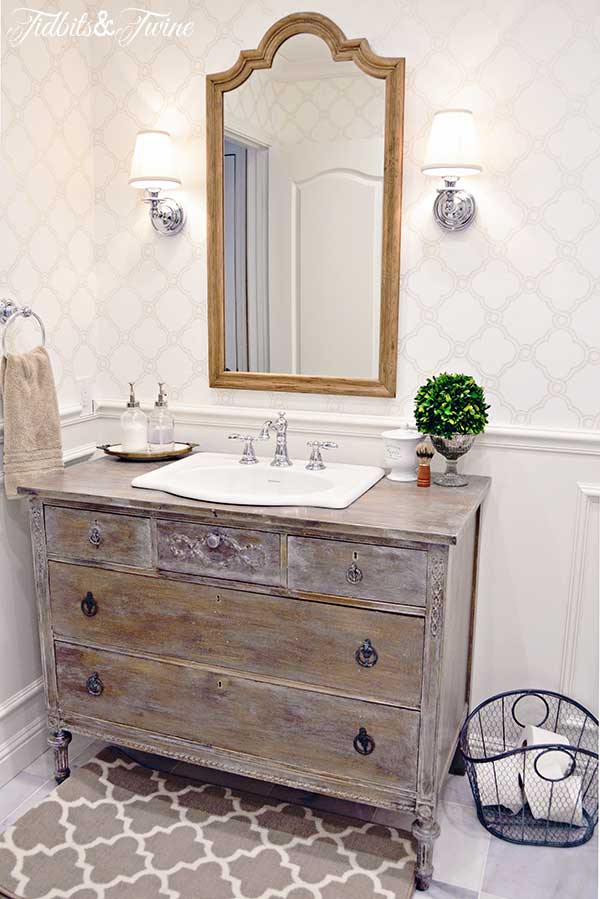 Vintage rustic style vanity made from an old dresser used to save money on a bathroom remodel 
