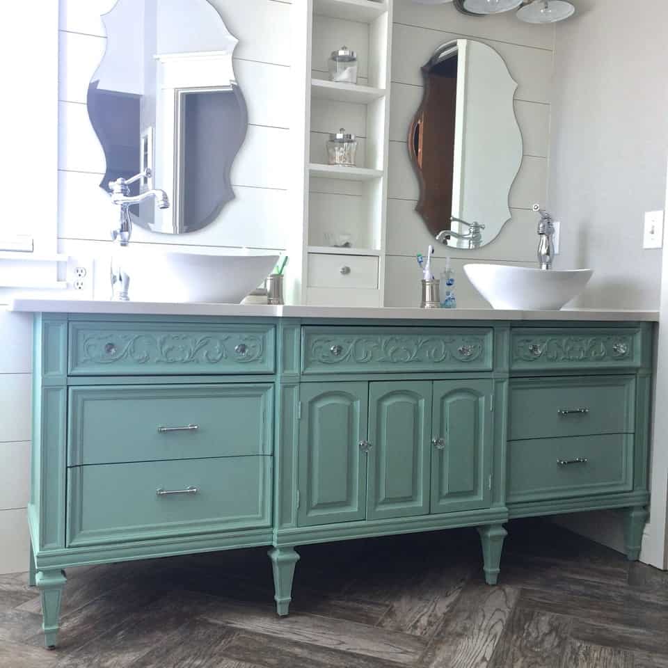 Using large bathroom vanities made out of old dressers can fill any space in a large bathroom remodel with modern touches